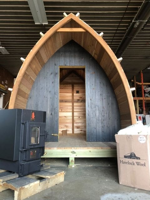 timber arched with a kuuma stove in minnesota