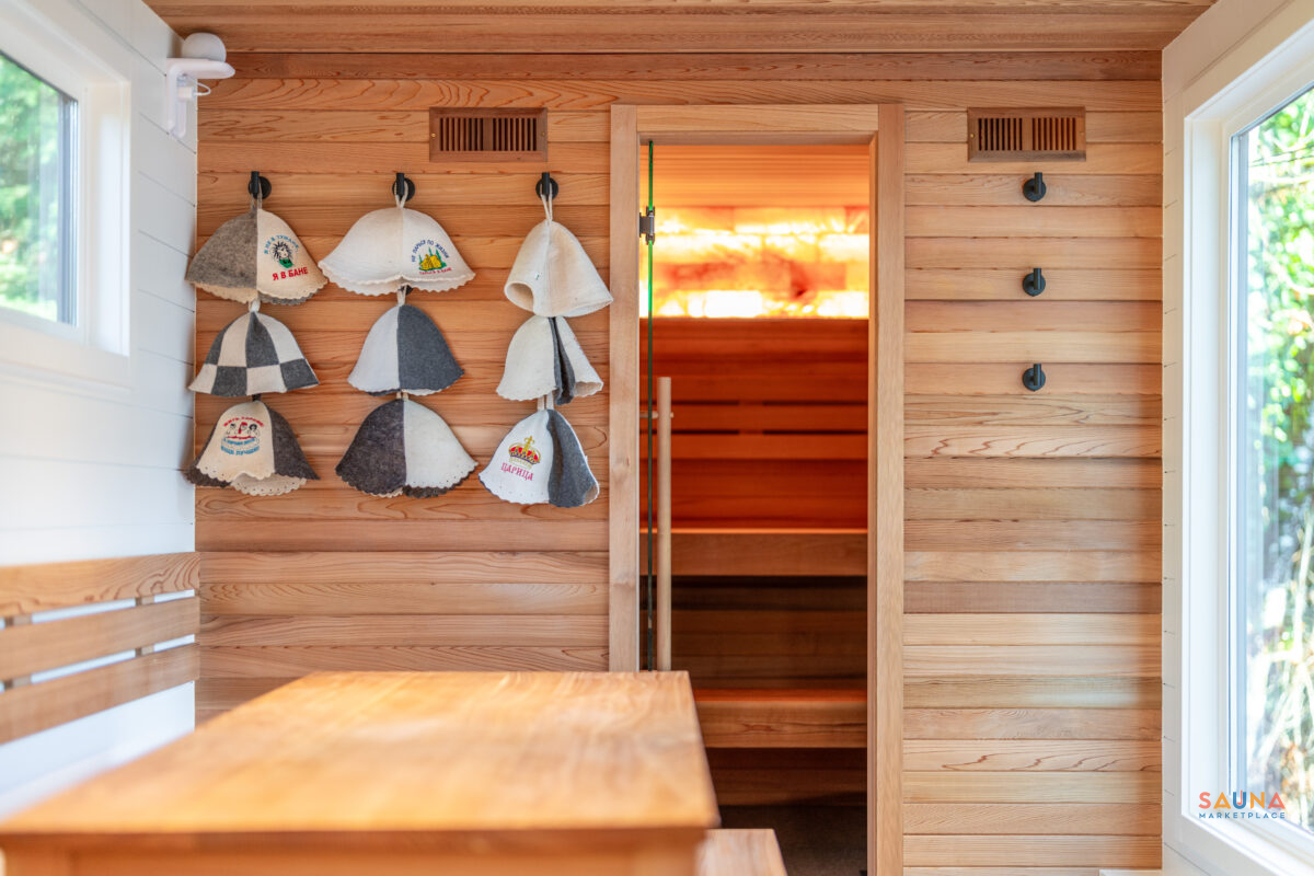 Mobile Sauna Entryway With Hats On Display In Spa On Wheels Out Of Oregon And Washington