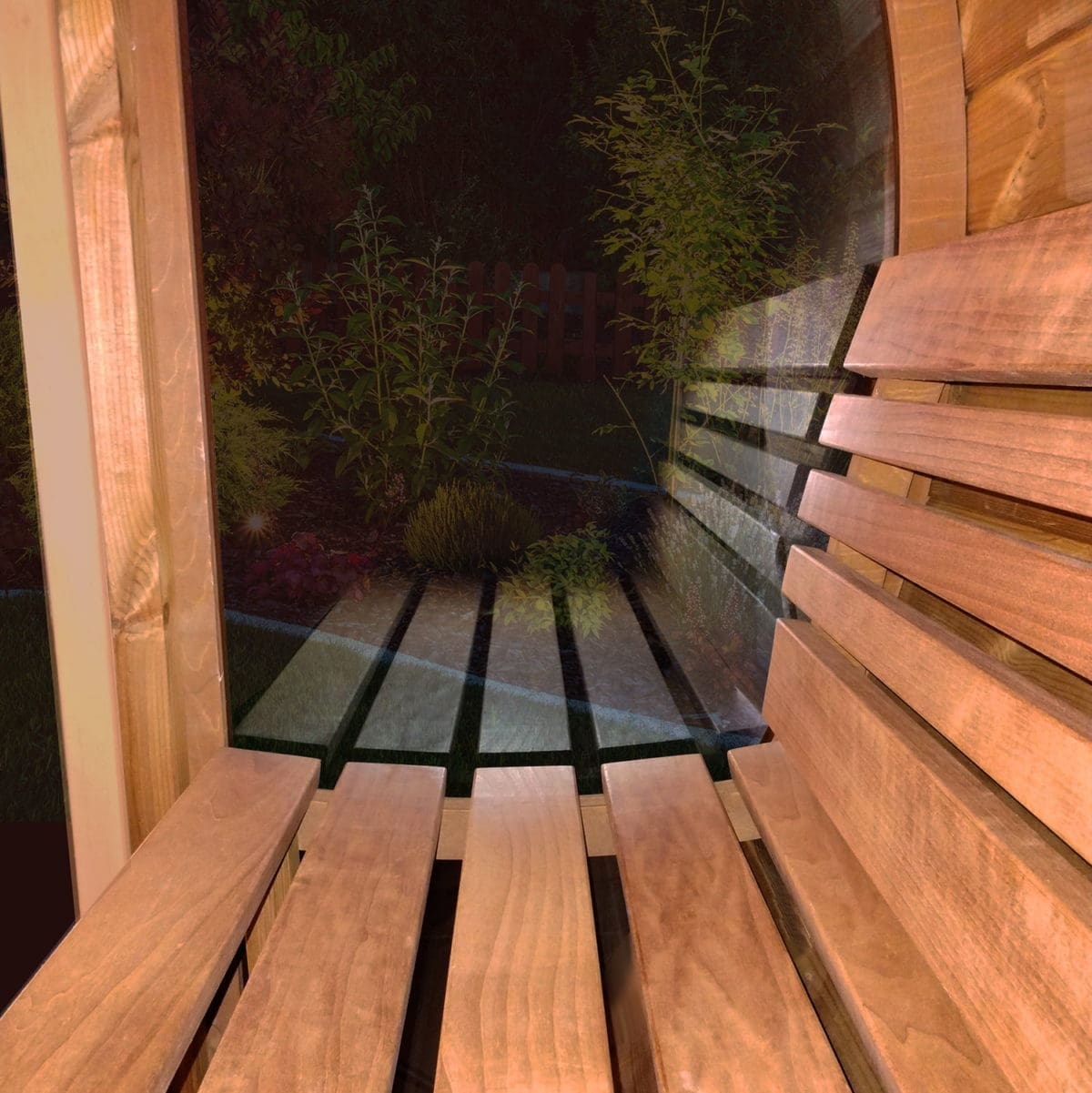 The image showcases a close-up view of the SaunaLife Ergo Barrel Sauna's seating area, particularly highlighting the ergonomic bench with a built-in backrest. The bench, made from grade A aspen, is designed to provide optimal comfort during the sauna experience.