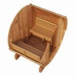 Aerial cutaway view of the SaunaLife 4-Person Barrel Sauna Kit, revealing the interior and exterior simultaneously, showcasing the ergonomic thermo-aspen bench and premium arched backrest