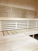 Interior right side view of SaunaLife Model X7 indoor sauna kit, showcasing the premium Nordic Spruce walls and elegant design features.