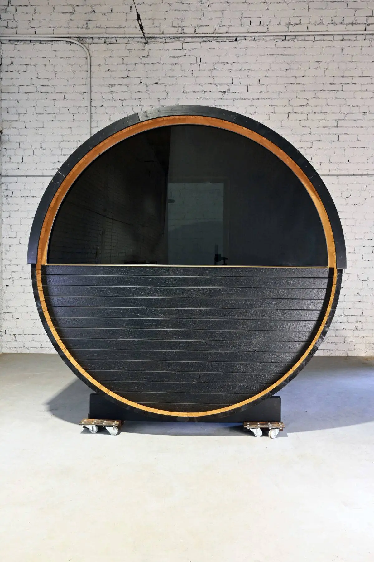 Thermory Ignite Barrel Sauna From Back With Large Panoramic Window