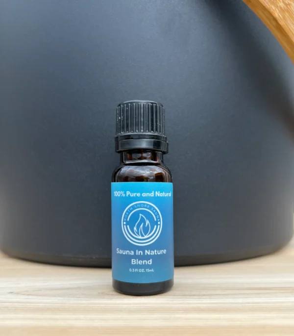 Bottle of essential oil labeled "Sauna in Nature"