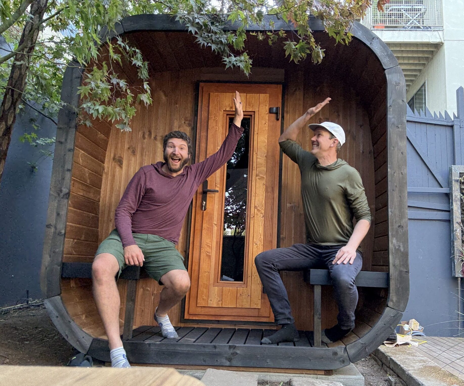 Ben Burger and Ben Frizzell together outside a sauna